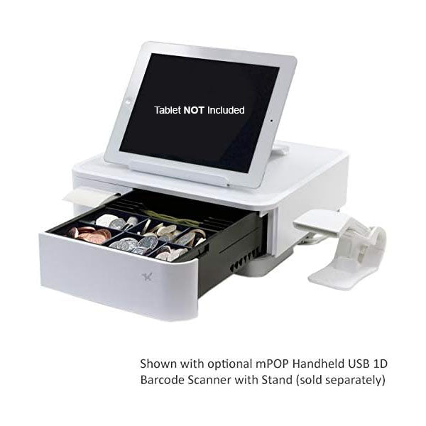 The mPOP POS from PCPOS Systems is a modern white cash register with an open drawer filled with coins and notes. It includes a tablet placeholder marked Tablet NOT Included, a bracket, and mentions the scanner is sold separately. Ideal for subscription services.