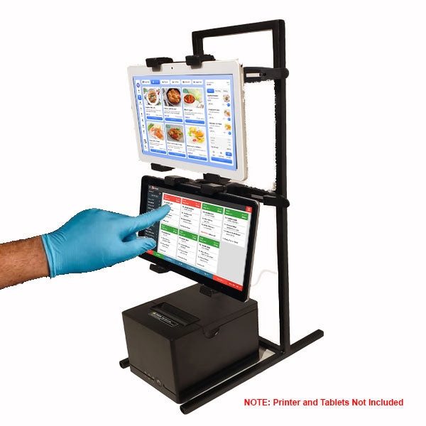A gloved hand touches a tablet on the black PCPOS Tablet Tower by PCPOS Systems, a POS clamp mount with 3 TabDock holders for 7–10 inch tablets. Ideal for delivery apps and order management. Printer and Tablets Not Included.