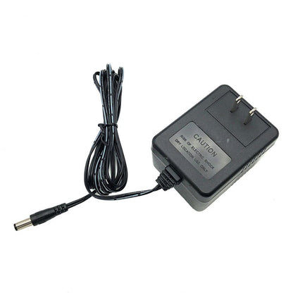 A USED Like New Protran Power Supply delivers 12V 1.0A (20W) output from a 120VAC 60Hz input. It features a black design, two-prong plug, long cable with barrel connector, and a front-facing caution label for safety.