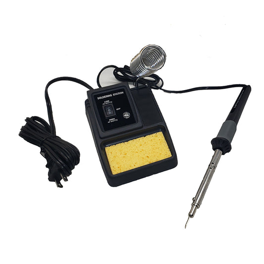 The Dual Heat Soldering Station by PCPOS Systems includes a switchable 20/40 watt iron, a coil spring holder, and a tray with a sponge-pad tip cleaner. The power cord is neatly coiled beside the unit.