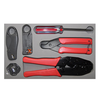 The INF RF Crimp/Strip Tool Kit includes a screwdriver, cable stripper, crimp tool, cutter, two black tools, and connectors in a clear bag—all organized in a gray foam tray.