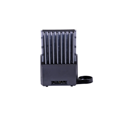 The CPI T-Flex Canadian Coin Dispenser is a black electronic device with vertical slots for comb bindings and a small round coin dispenser on the right side, shown against a white background.