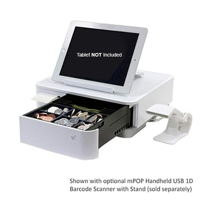 The mPOP POS from PCPOS Systems is a modern white cash register with an open drawer filled with coins and notes. It includes a tablet placeholder marked Tablet NOT Included, a bracket, and mentions the scanner is sold separately. Ideal for subscription services.